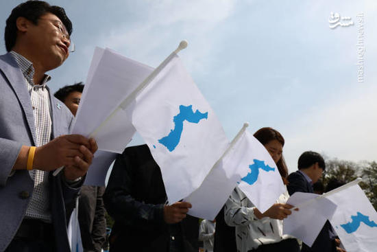 عکس/ خوشحالی مردم از اتحاد مجدد دو کره