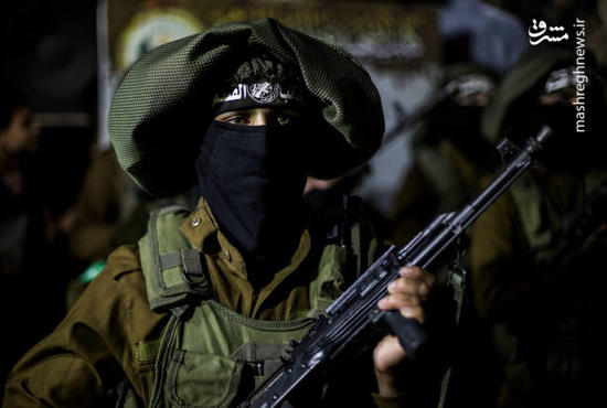 عکس/ رژه شبانه سربازان حماس