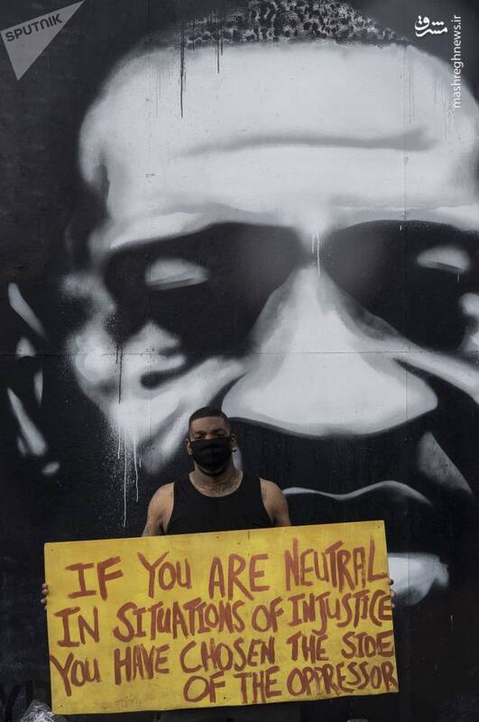 گرافیتی جرج فلوید در محل قتلش در مینیاپولیس