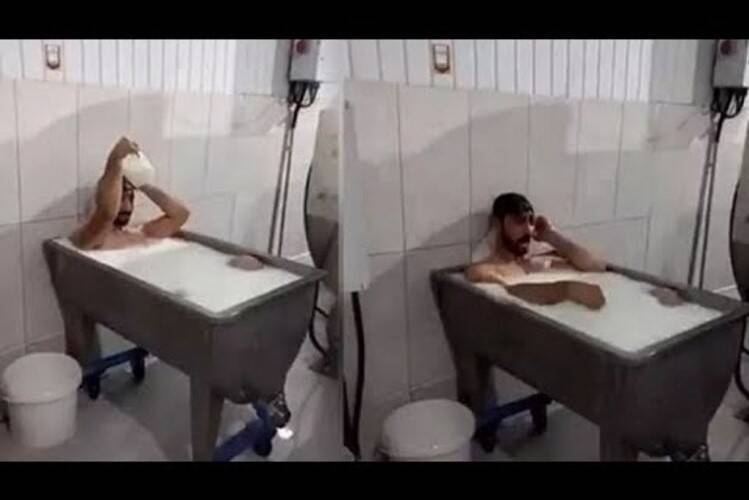 حمام کردن کارگر شرکت لبنیاتی در وان شیر! +فیلم