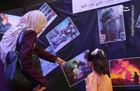 برپایی نمایشگاهی در غزه پیرامون جنایات رژیم صهیونیستی در جنگ ۱۱ روزه +عکس
