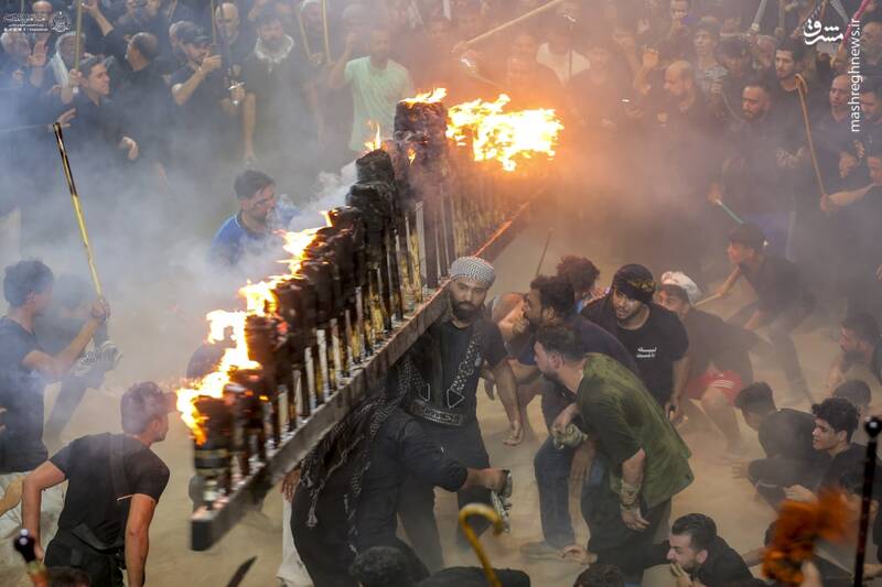 عکس/ آیین سنتی مشعل گردانی در نجف اشرف