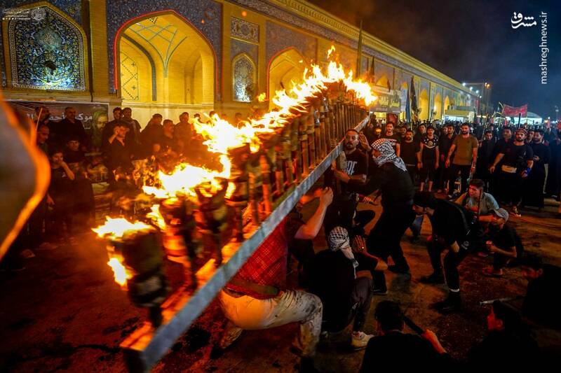 عکس/ آیین سنتی مشعل گردانی در نجف اشرف