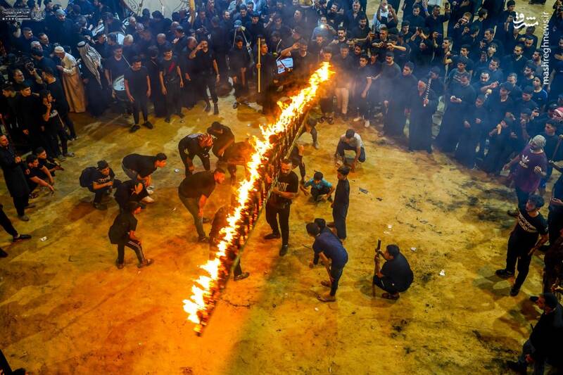 عکس/ آیین سنتی مشعل گردانی در نجف اشرف