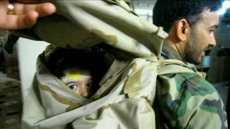 قاچاق انسان در کولهپشتی شهید مدافع حرم! +عکس