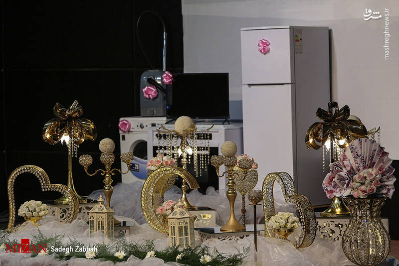 عکس/ اهدای ۱۰۰۰ سری جهیزیه به زوجهای جوان در مشهد