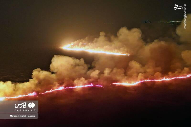 عکس/ شعلههای آتش بر تنِ تالاب میقان