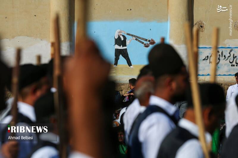 عکس/ آئین سنتی پهلوانی بیل گردانی نیم ور