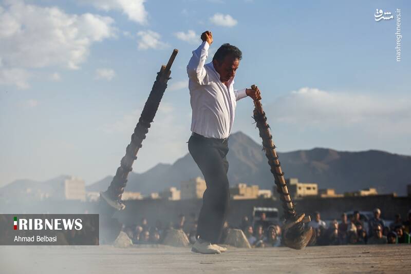 عکس/ آئین سنتی پهلوانی بیل گردانی نیم ور