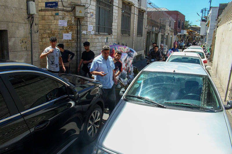 عکس/ چرخی برای چرخاندن چرخ های زندگی