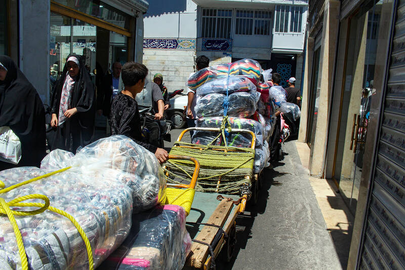 عکس/ چرخی برای چرخاندن چرخ های زندگی