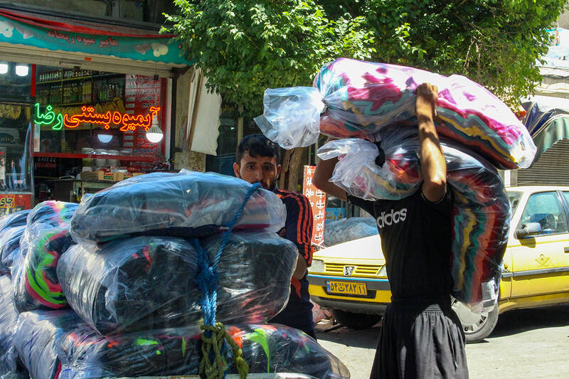 عکس/ چرخی برای چرخاندن چرخ های زندگی