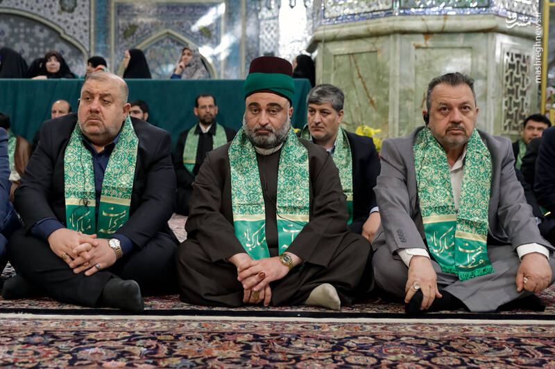 عکس/ آیین تعویض پرچم گنبد منور رضوی