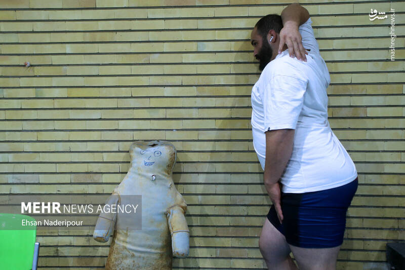 عکس / رکورد گیری تیم ملی وزنه برداری 33