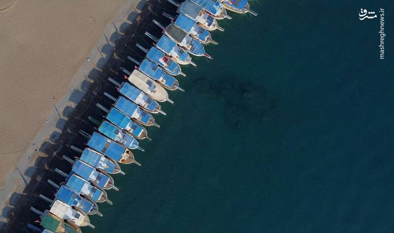 تصویر هوایی از پارک شدن قایق‌ها در ساحل آدرسان واقع در آنتالیا _ ترکیه