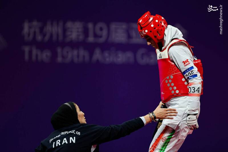 عکس / صعود باوی تکواندو کار ایرانی به یک چهارم نهایی 6