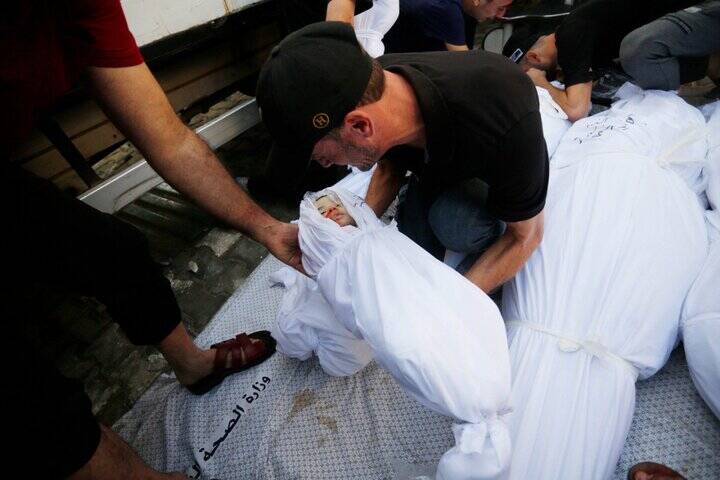 قتل عام ۴۷ خانواده فلسطینی/وداع با شهدای خانواده ایرانی الاصل غزه