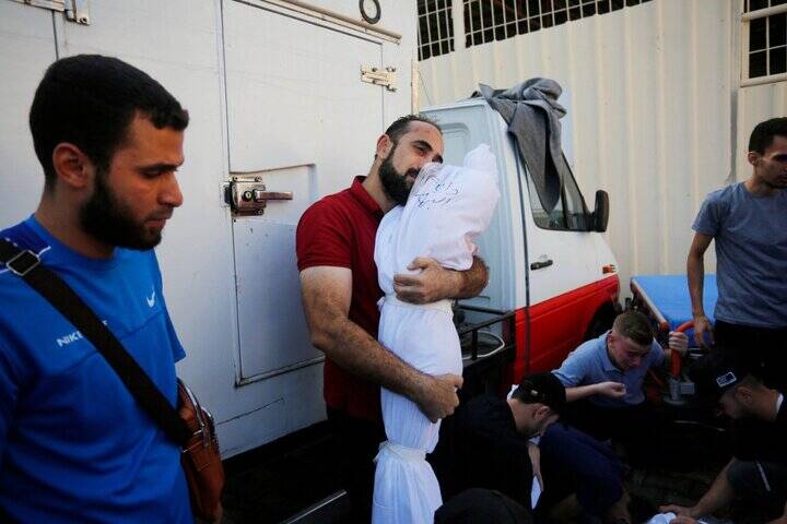 قتل عام ۴۷ خانواده فلسطینی/وداع با شهدای خانواده ایرانی الاصل غزه