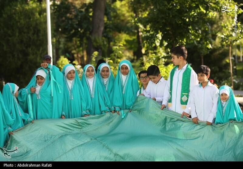 عکس / اهتزاز پرچم منقش به نام حضرت علی (ع) بر فراز همدان 19