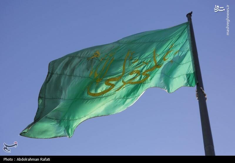 عکس / اهتزاز پرچم منقش به نام حضرت علی (ع) بر فراز همدان 17