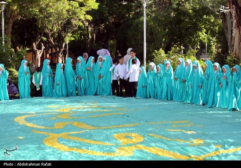 عکس / اهتزاز پرچم منقش به نام حضرت علی (ع) بر فراز همدان 15