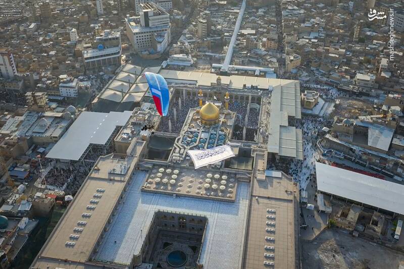 عکس / اهتزاز پرچم غدیر بر فراز آسمان حرم امیرالمومنین 11