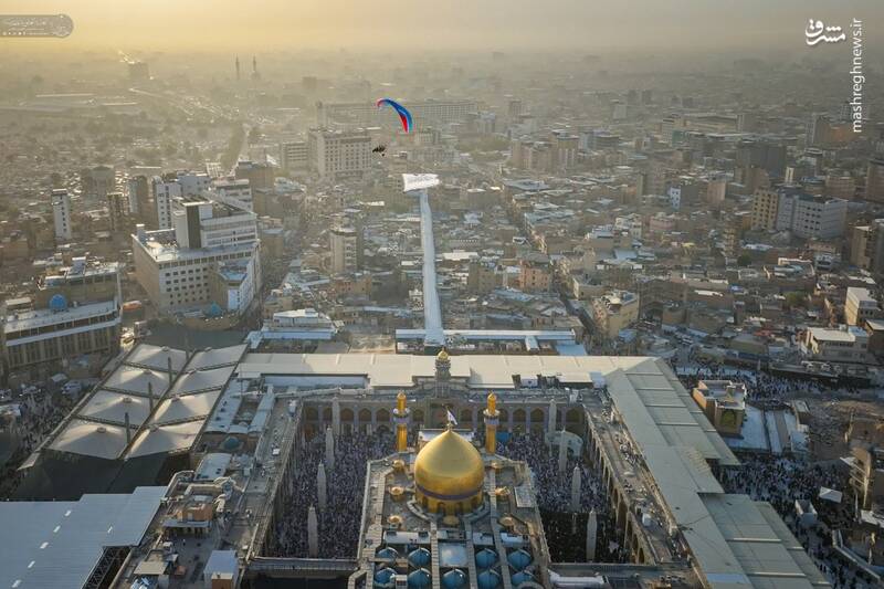 عکس / اهتزاز پرچم غدیر بر فراز آسمان حرم امیرالمومنین 2