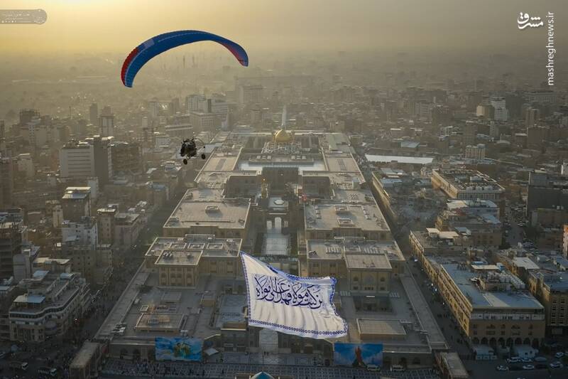 عکس / اهتزاز پرچم غدیر بر فراز آسمان حرم امیرالمومنین 5