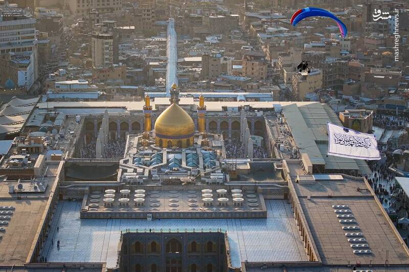 عکس / اهتزاز پرچم غدیر بر فراز آسمان حرم امیرالمومنین 6