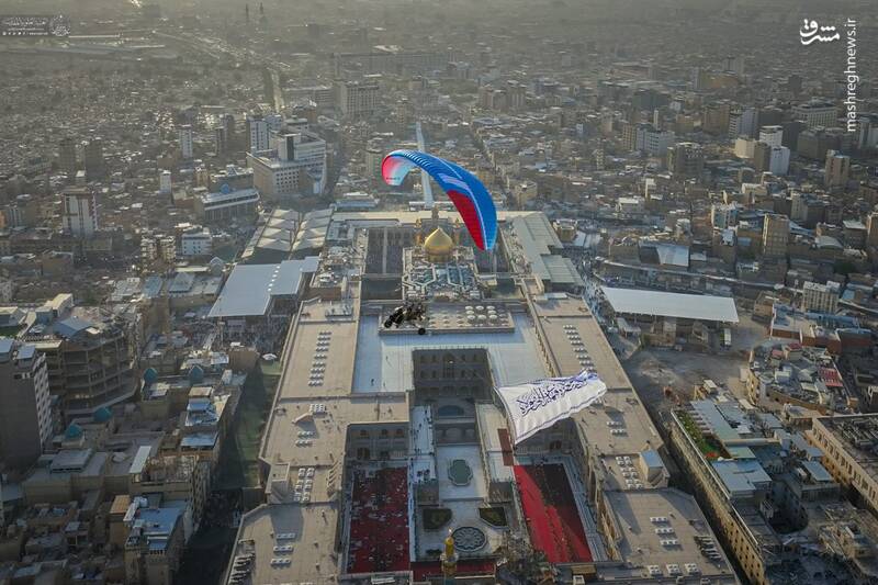 عکس / اهتزاز پرچم غدیر بر فراز آسمان حرم امیرالمومنین 3