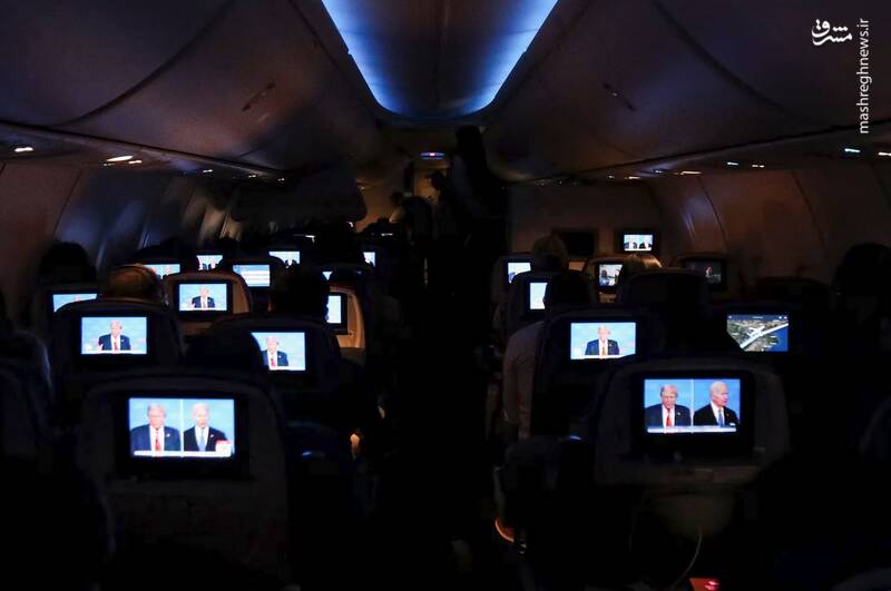 مردم مناظره ریاست جمهوری امریکا را در پرواز خطوط هوایی دلتا به میامی تماشا می کنند