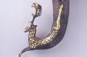 تصویری از ریتون زراندود شده هخامنشی