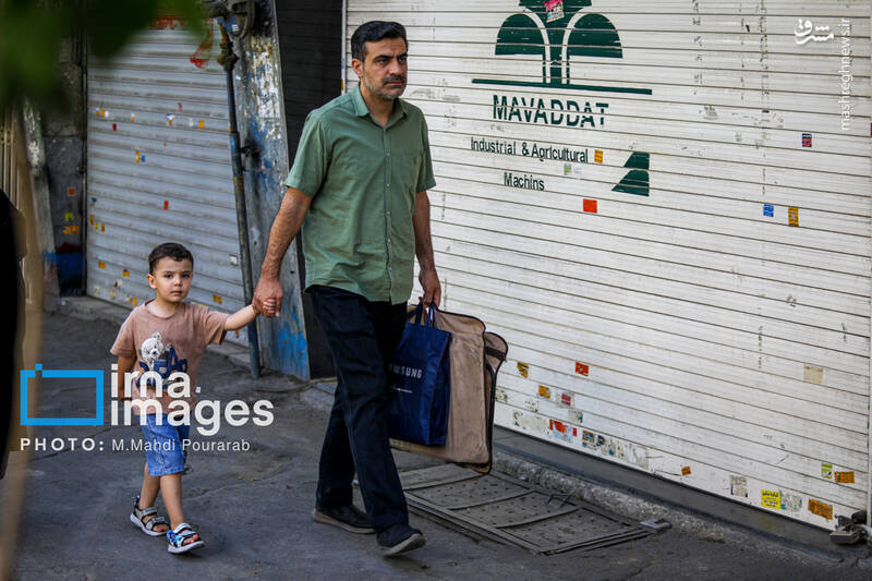 عکس/ قرائت دعای «عرفه» در حسینیه صنف «لباس فروشان»