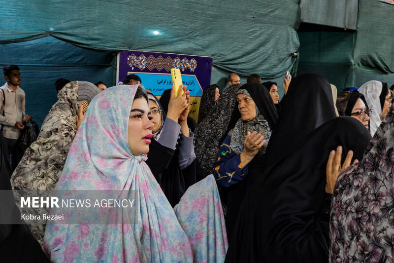 حرم مطهر امام رضا (ع) در شب بارانی عید قربان