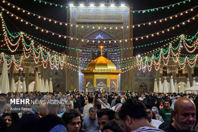 حرم مطهر امام رضا (ع) در شب بارانی عید قربان