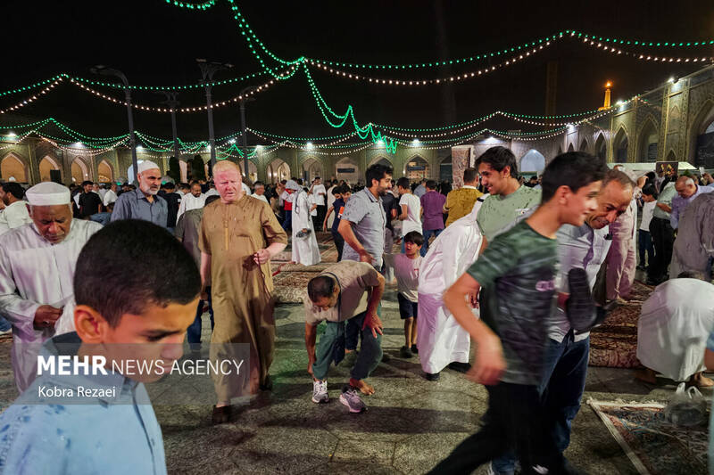 حرم مطهر امام رضا (ع) در شب بارانی عید قربان