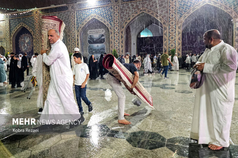 حرم مطهر امام رضا (ع) در شب بارانی عید قربان