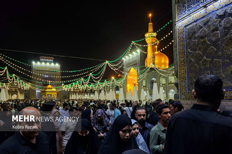حرم مطهر امام رضا (ع) در شب بارانی عید قربان