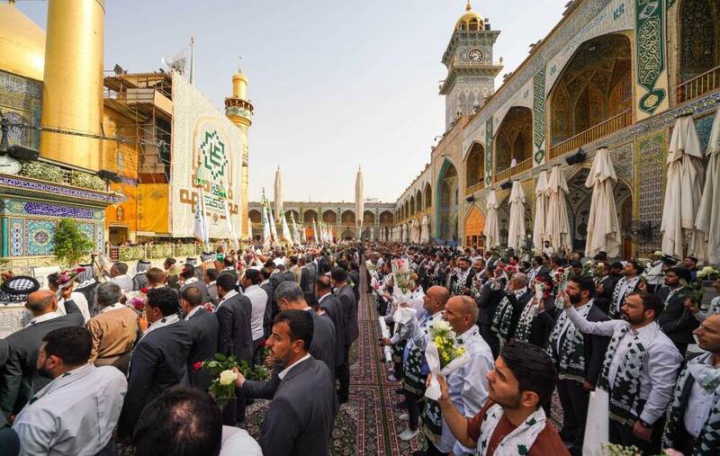 تصاویر زیبا از برافراشتن پرچم عید غدیر خم در حرم امام علی (ع) 3