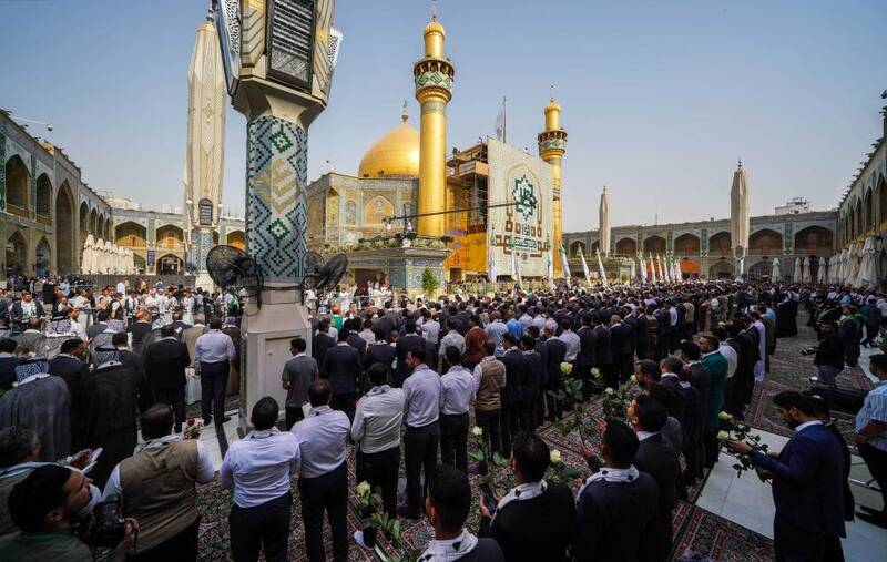 تصاویر زیبا از برافراشتن پرچم عید غدیر خم در حرم امام علی (ع) 4
