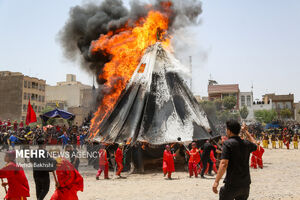 عکس/ آیین خیمه‌سوزان عاشورا در هیئت خیام‌الحسین(ع) قم‎