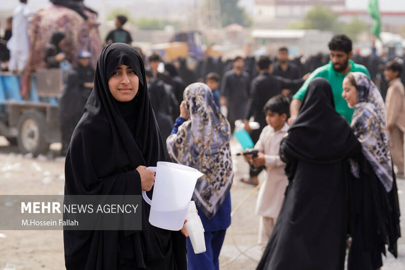 عزاداری مردم شیعه و سنی شهر بزمان در روز عاشورا