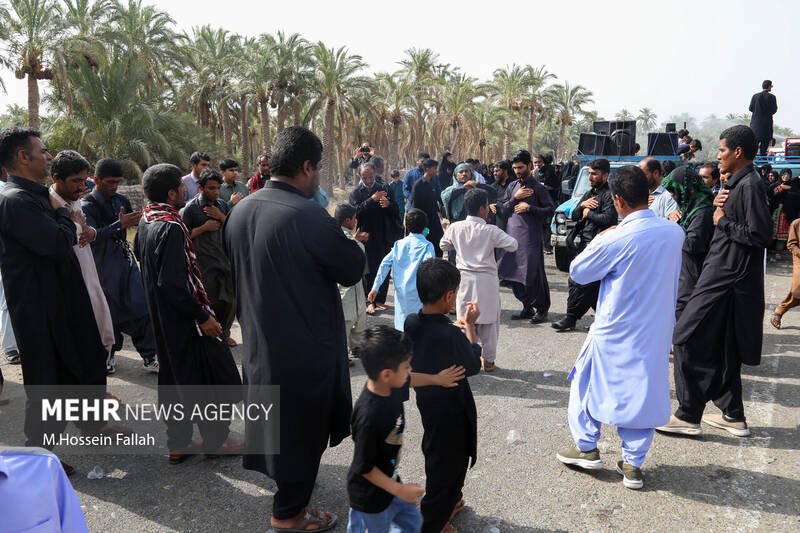 عزاداری مردم شیعه و سنی شهر بزمان در روز عاشورا