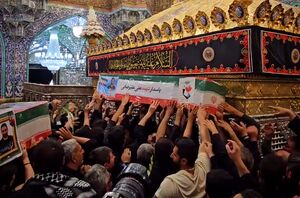 طواف پیکر دو شهید جنگ ۱۲ روزه دور ضریح حضرت معصومه(س)