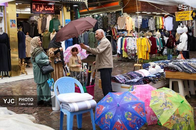 عکس / بدرقه‌ی تابستان با بارش باران در رشت 9