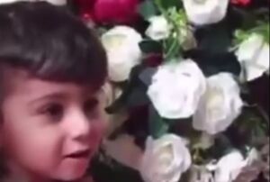 آخرین وداع فرزند شهید عطوی با پدرش