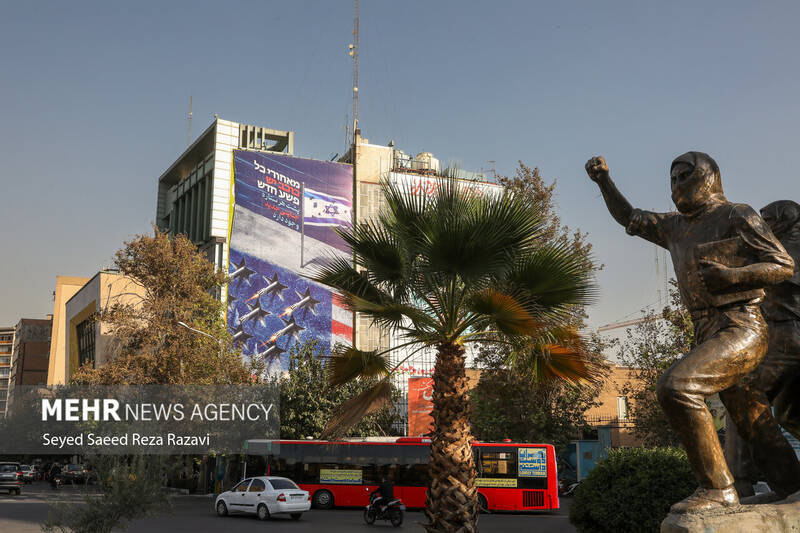 عکس/ رونمایی از طرح جدید دیوار نگاره میدان فلسطین