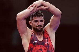 پیامی که یک کشتی گیر ایرانی با دستانش فرستاد!