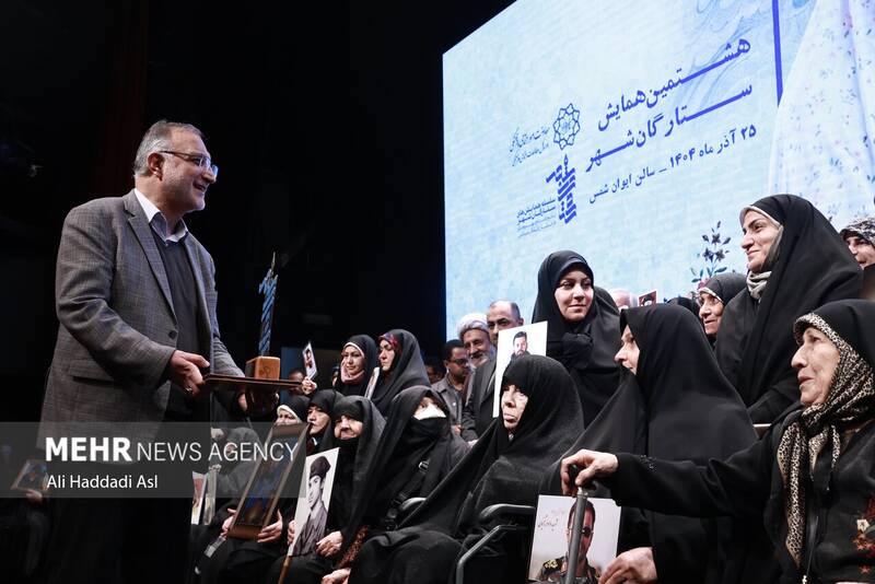 آئین تجلیل از مادر شهیدان حسن و محمد باقری