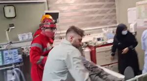 عکس/ امدادرسانی هلال احمر به مجروحان حمله رژیم صهیونی و آمریکا به مناطقی از تهران